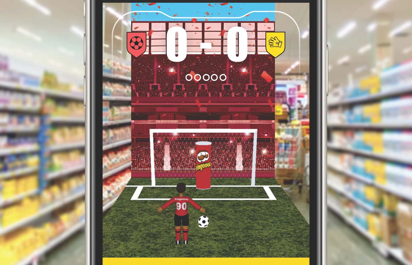 Mobile screen displaying a 3D avatar getting ready to shoot a penalty at a Pringles tube in-goal