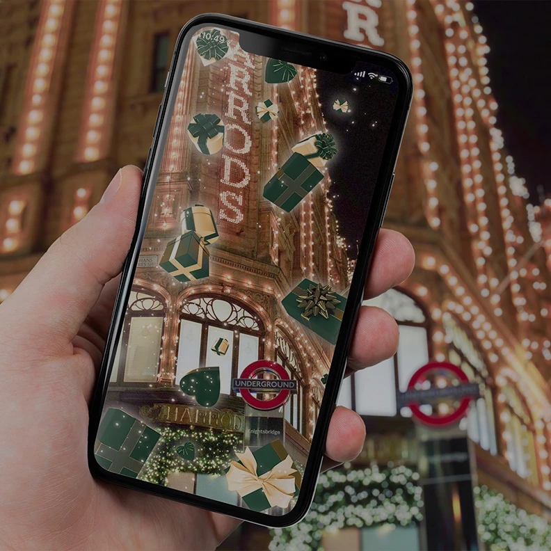 Harrods Christmas AR Experience on a handheld mobile device