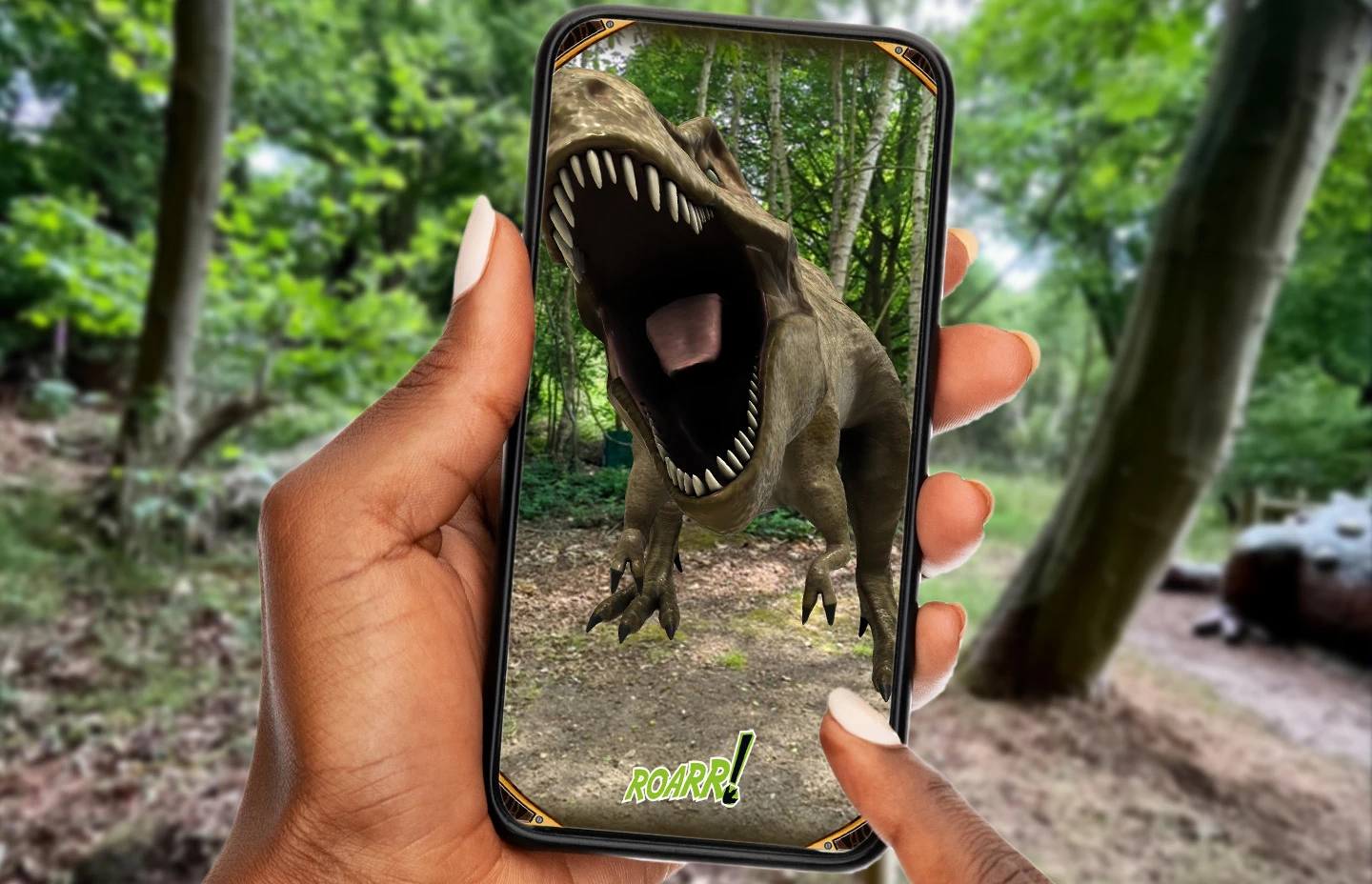 A phone showing an AR TRex roaring
